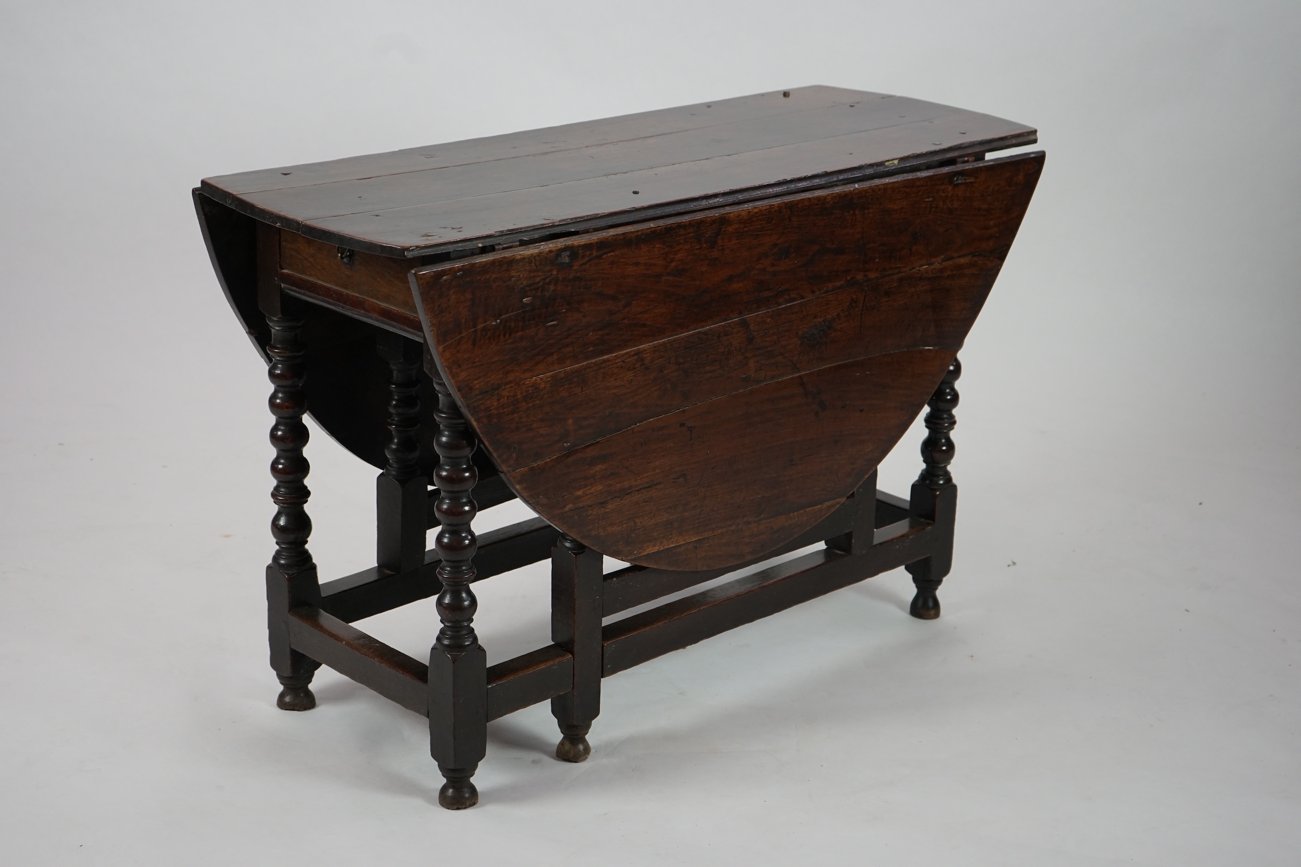 A 17th century and later oak gateleg table